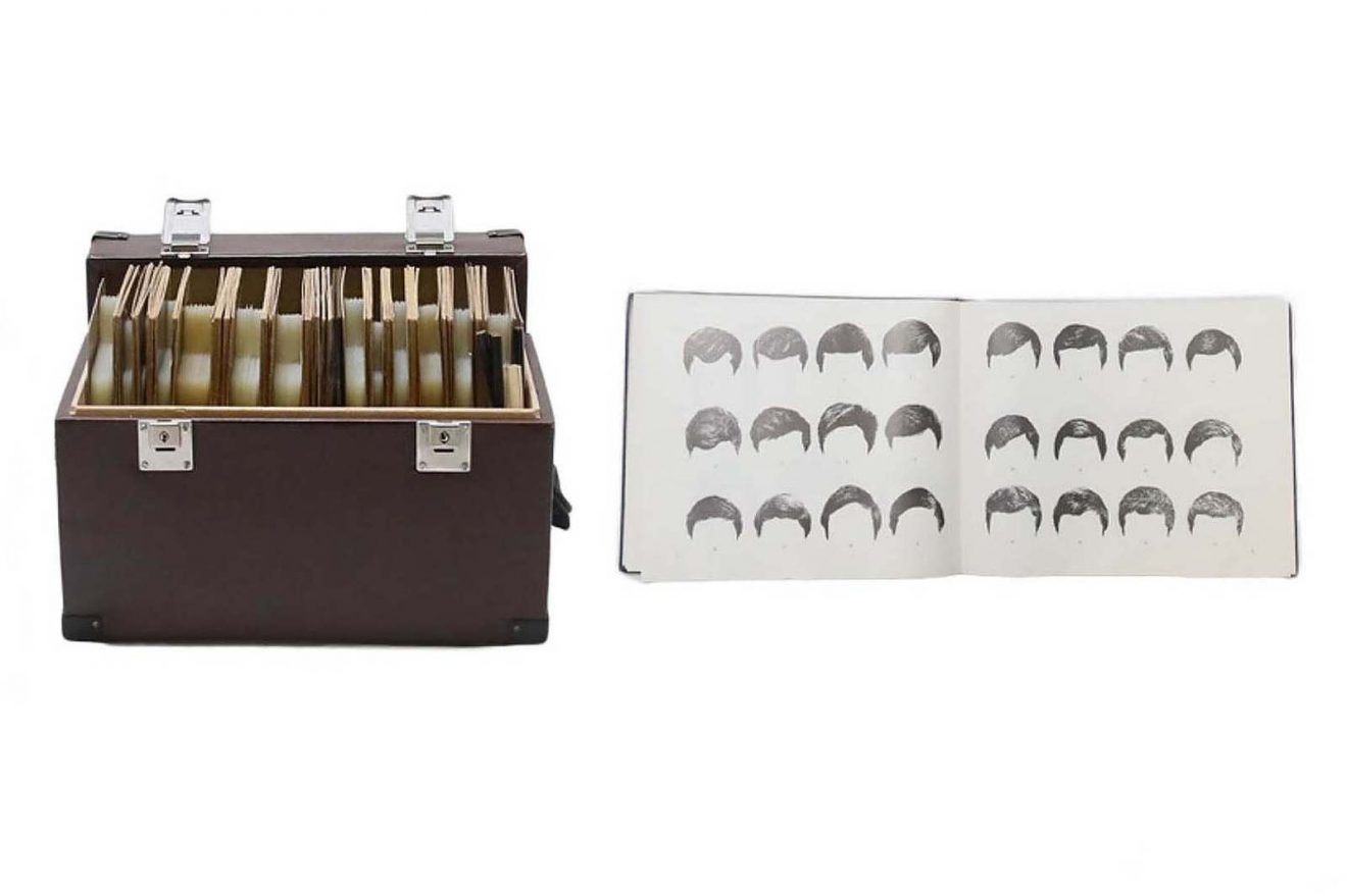 On the left, an "IDENTIKIT" case (USSR) with hundreds of cards for facial identification (1988 to 1989). On the right, a book showing various types of hairstyles. This set was used by the MVD (police) and the KGB (secret services) to draw up sketches. Comes from Soviet Belarus. Marché Dauphine - Photo Sixtine Legrand