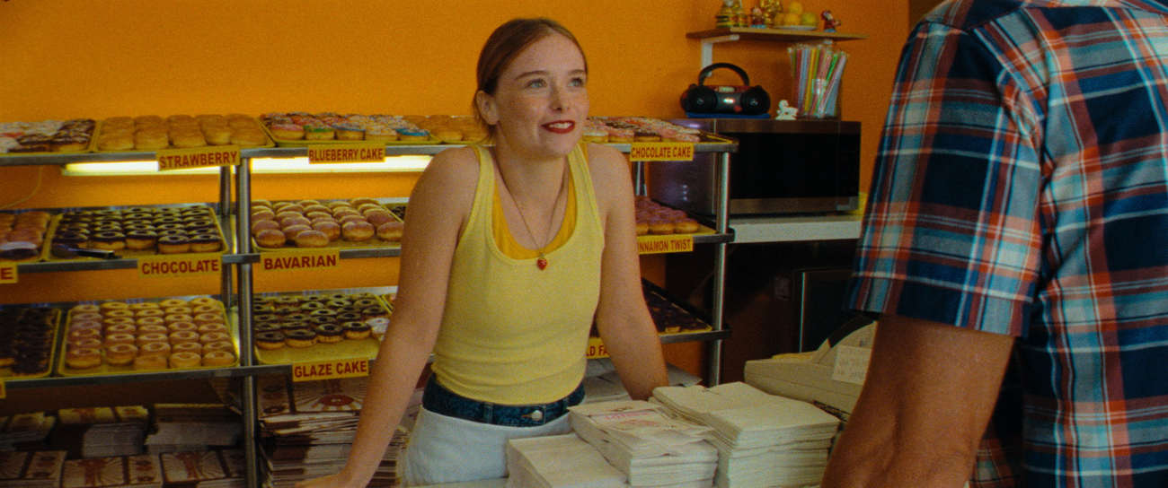 The young Suzanna Son plays Strawberry, a charming waitress in a donut store, whom Mikey imagines as a future porn star